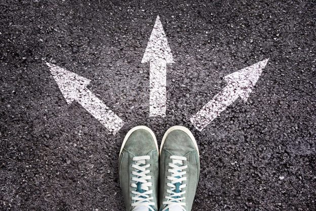 Photo of shoes in front of 3 paths